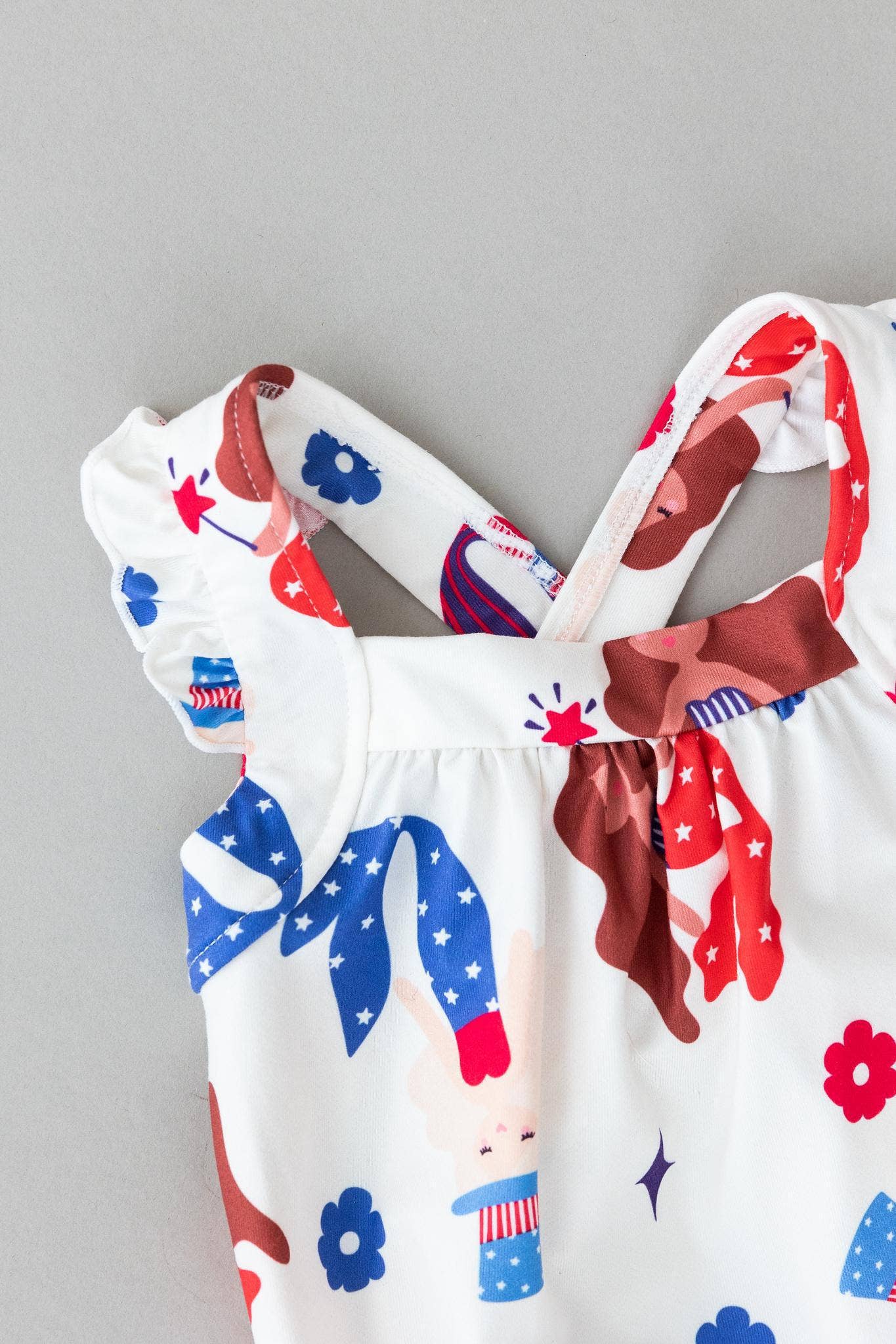 Mila & Rose - Mer-Made in the USA Ruffle Cross Back Romper