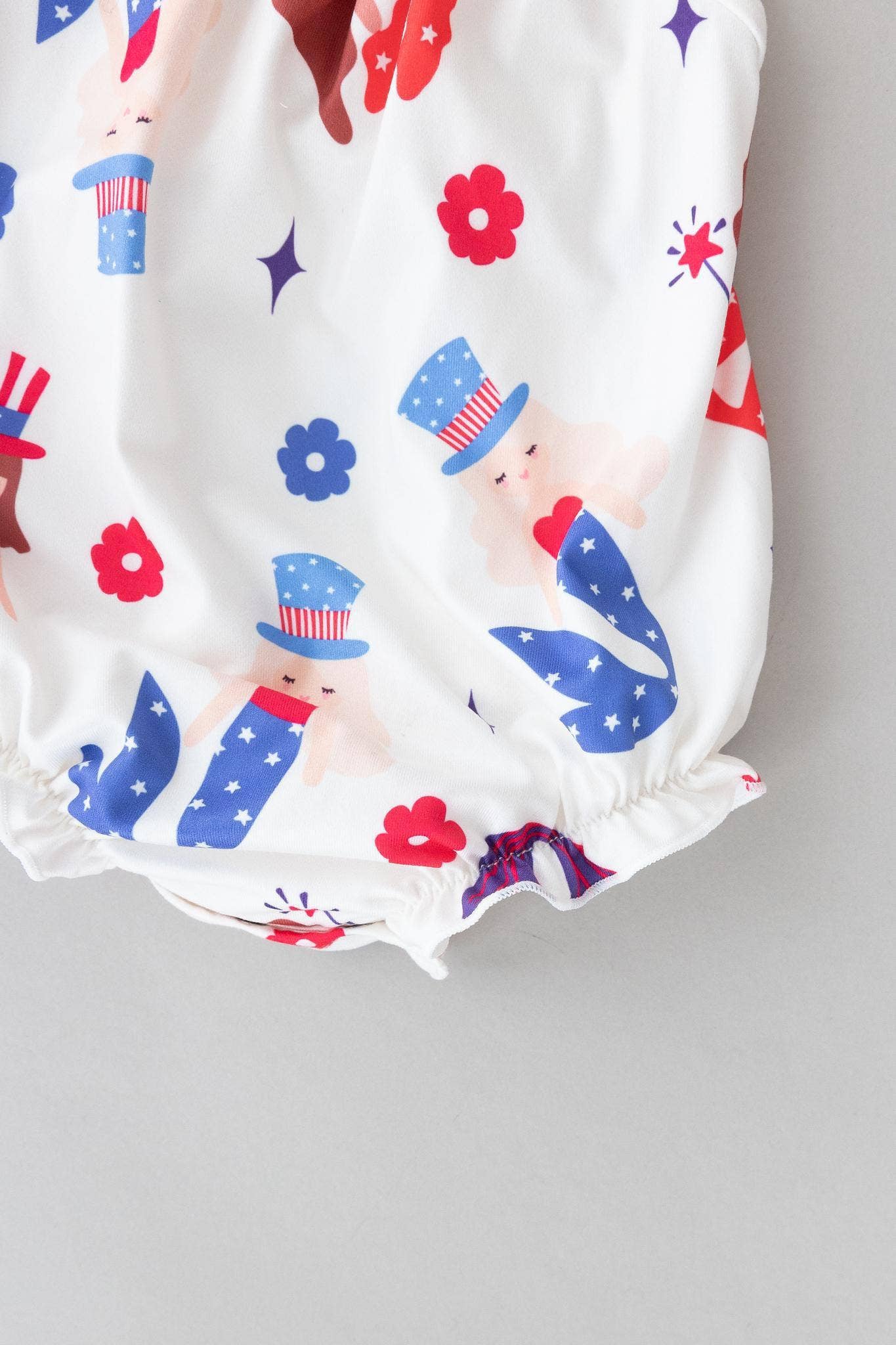Mila & Rose - Mer-Made in the USA Ruffle Cross Back Romper