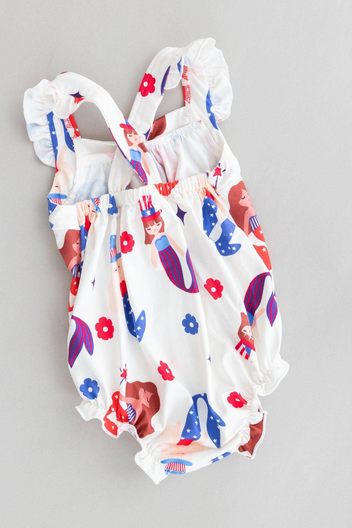 Mila & Rose - Mer-Made in the USA Ruffle Cross Back Romper